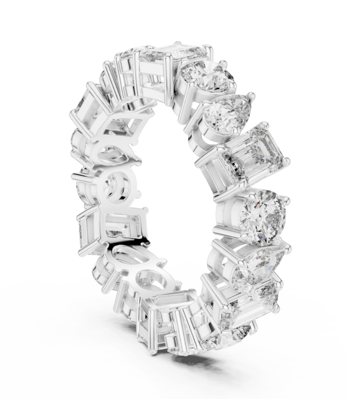 Mixed Cut Diamond Eternity Band Ring in 18K White Gold, adorned with a combination of round, cushion, emerald, radiant, and pear-cut diamonds that create a dynamic, sparkling design.