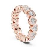 Heart diamond eternity band in rose gold with bezel set heart shaped diamonds