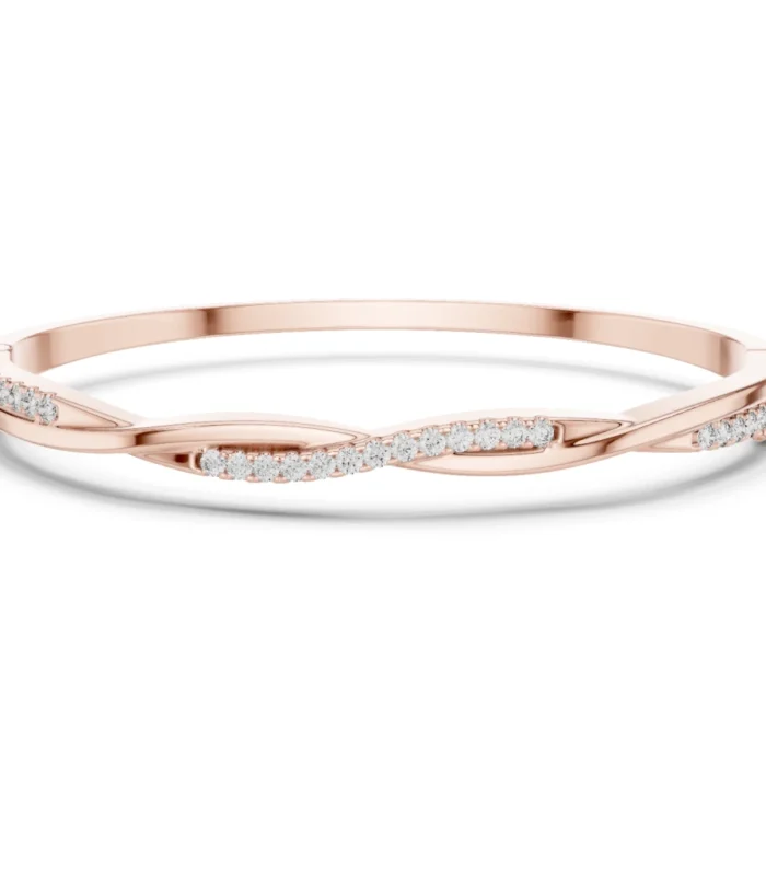 Twisted pave diamond bangle in rose gold with infinity design.