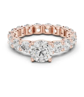 Round Brilliant Cut Diamond Eternity Band Ring in Rose Gold featuring a continuous line of hand-set round diamonds.
