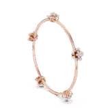 Rose gold floral cluster diamond bangle with round cut diamonds.