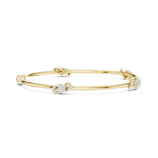 Yellow gold open knot diamond bangle fine diamond jewellery