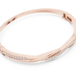 Rose gold diamond twist bangle side view fine diamond bracelet