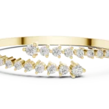 Yellow gold channel set round diamond bangle fine diamond jewellery