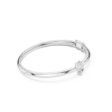 White gold oval motif diamond bangle side view luxury bracelet