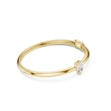 Yellow gold oval motif diamond bangle side view fine jewellery